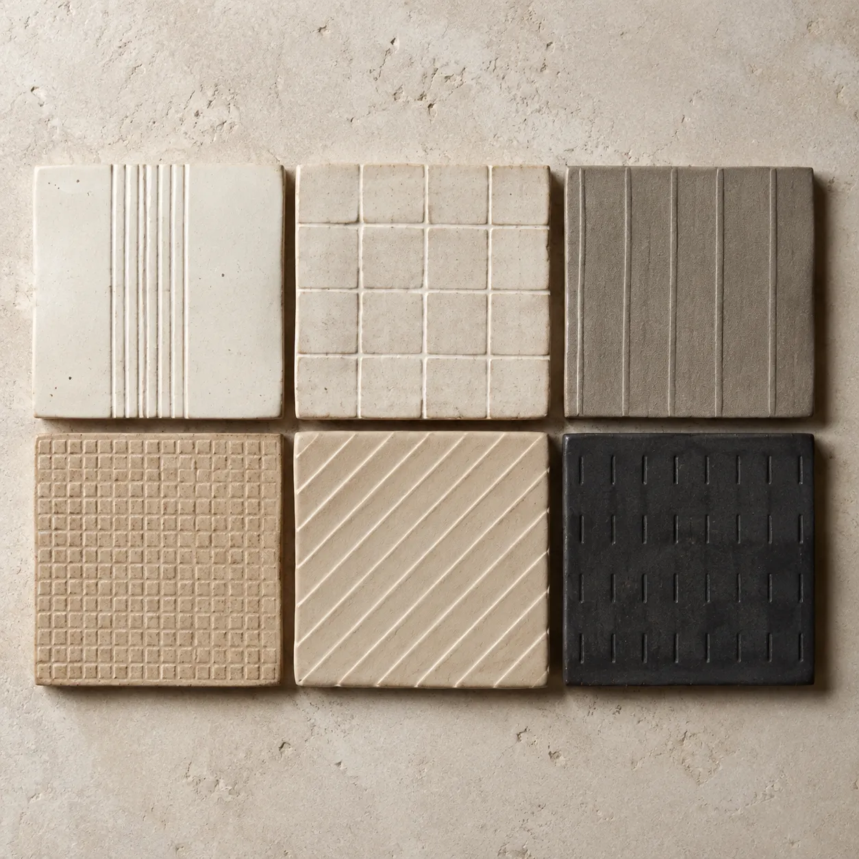 Warm white ceramic tile with fine parallel ridges